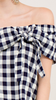 Navy Plaid off-shoulder top featuring a knot detail at bust